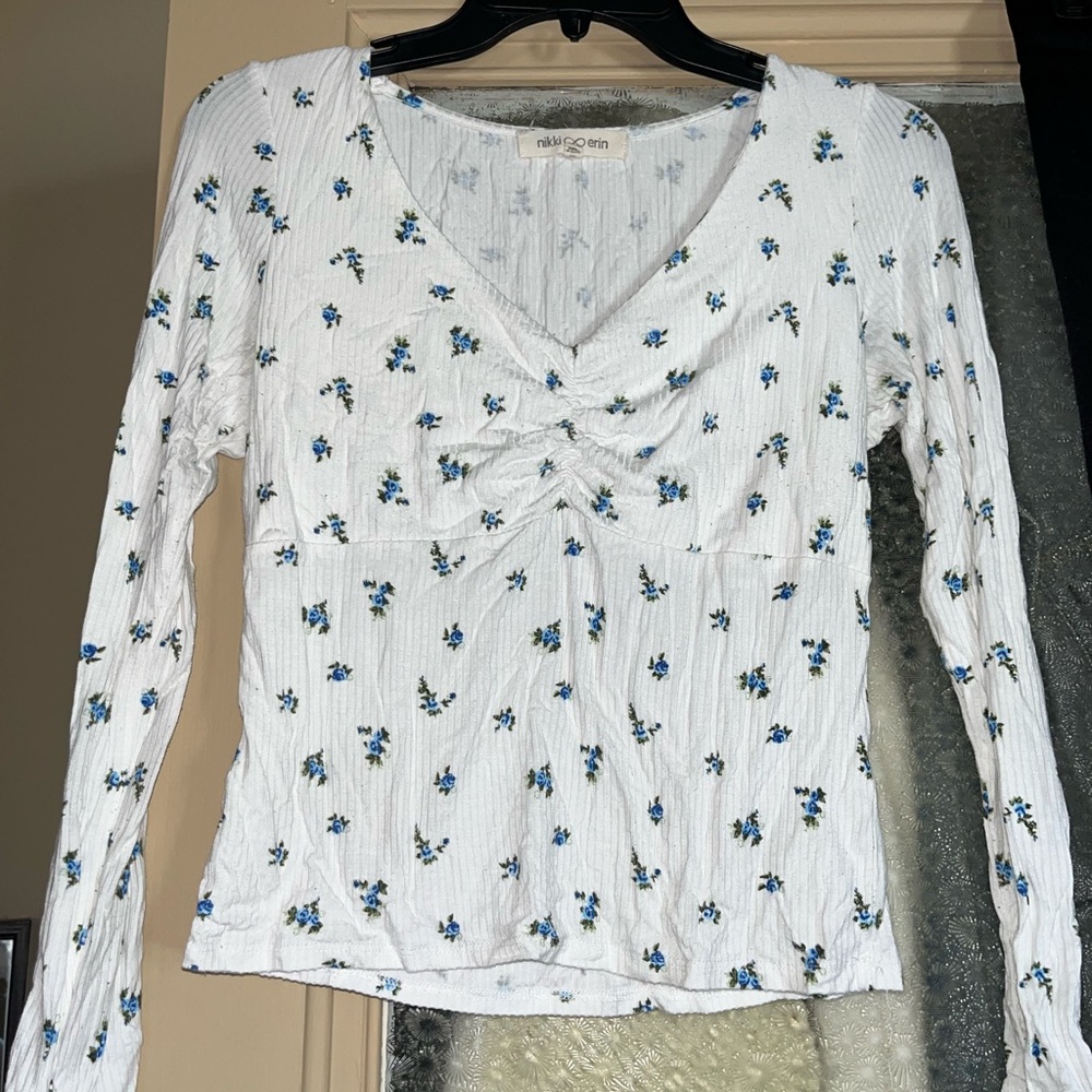 White and blue floral shirt